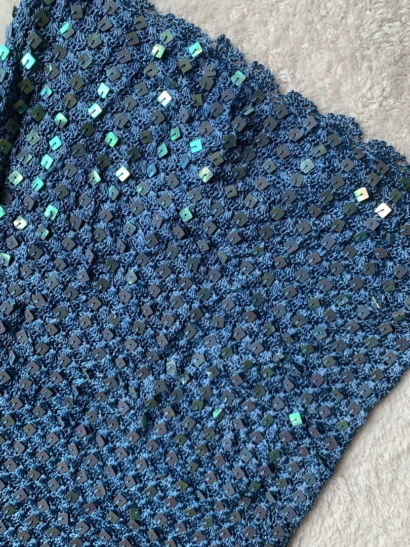 Full sequins Y2K Knitted Top in teal blue (Category: Blouses) located in Davao. Submitted by calli_2219 (Listing ID 1470154056, Image 3). Description: Super pretty on going bidding at blue app lock price 650 High quality fabric Can fit XS-Semi M.