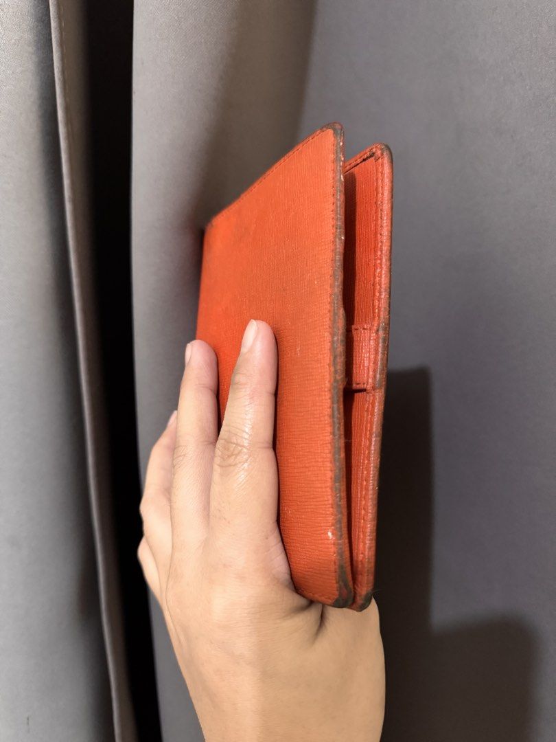 Furla bifold wallet (Category: Luxury Bags & Wallets) located in Manila. Submitted by mikmmmmik (Listing ID 1470152939, Image 3). Description: Furla bifold wallet. Can be used as a passport holder. 100% authentic. Price is negotiable. Complete with box, dustbag, and care card..