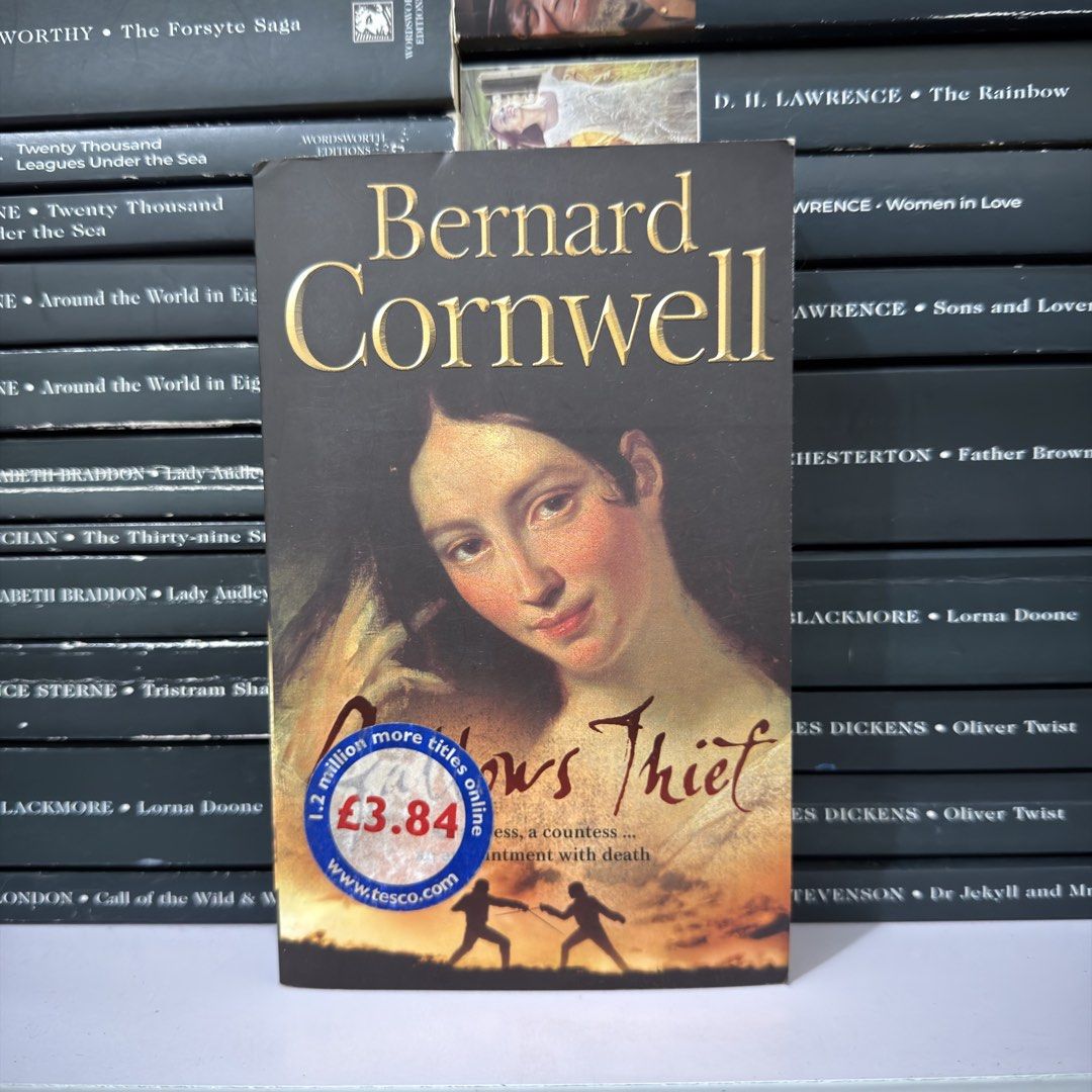 Gallows Thief by Bernard Cornwell Paperback Novel (Category: Storybooks) located in Lingayen. Submitted by readwjane (Listing ID 1470200007, Image 2). Description: - Title: Gallows Thief - Author: Bernard Cornwell - Format: Paperback with illustrated dueling cover art - Genre: Historical fiction / Mystery / Thriller - Plot highlights: An actress, a countess, and a high-stakes death sentence - Condition: Great read for fans of suspenseful drama.