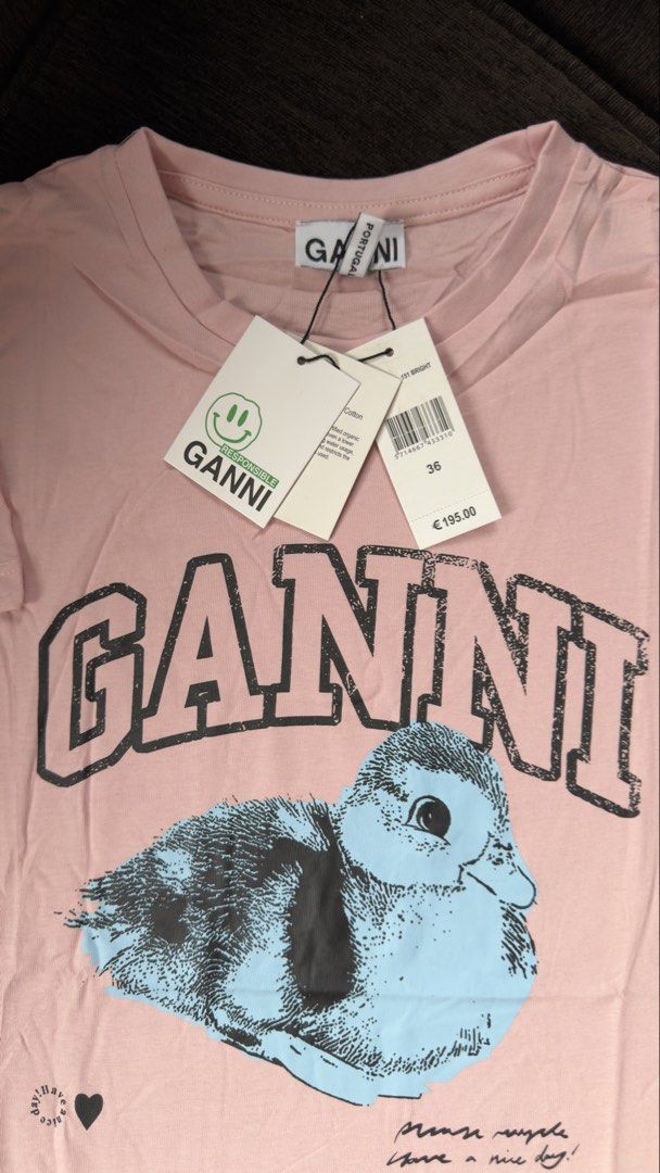 GANNI T-Shirt (Category: Shirts) located in Angat. Submitted by shopmyclosetbykris (Listing ID 1470314952, Image 2). Description: GANNI Women's OG quality shirts! Same tags ect. Highest quality fabric (stretchy) Limited pcs only! No more restock! With sizes, not free size Made in Portugal Price: 880 each only Location: Baliwag Bulacan .