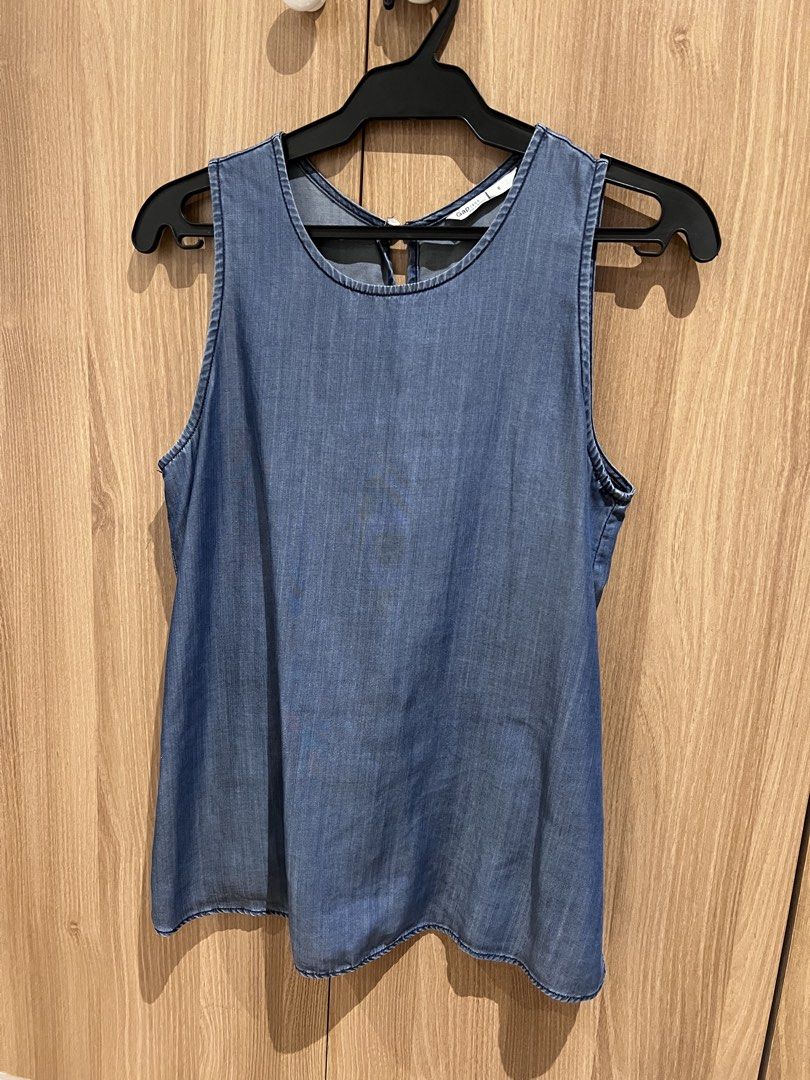 GAP Denim Sleeveless Top (Category: Sleeveless) located in Manila. Submitted by sph_preloved (Listing ID 1470212373, Image 1). Description: Price not negotiable unless buying at least 5 items. No ww photos. Location: QC Mode of delivery: grab/lalamove SF to be shouldered by the buyer .