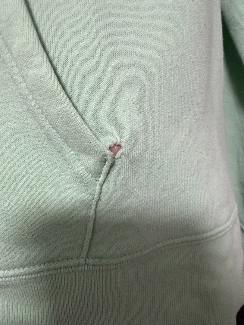 Gap Mint Green Zip Up Hoodie (Category: Coats, Jackets and Outerwear) located in Las Pinas. Submitted by ml.closet (Listing ID 1470314380, Image 2). Description: Has a hole by the pocket. Pls see pic.