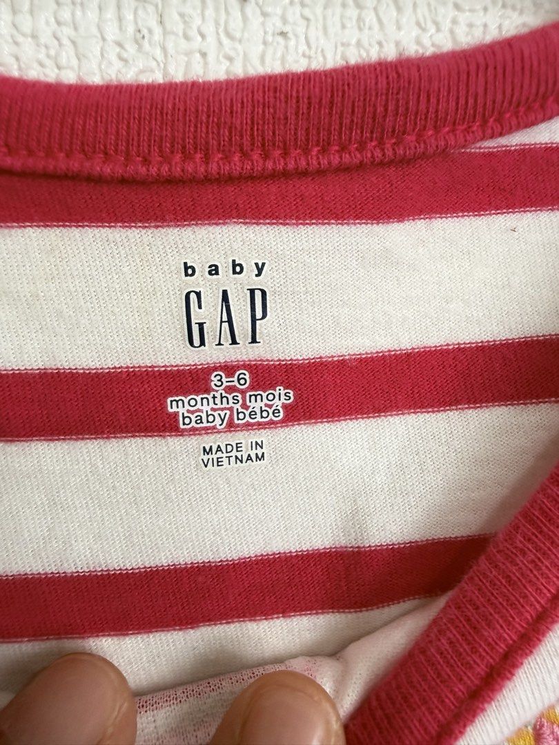 Gap onesie (Category: Babies & Kids Fashion) located in Dasmarinas. Submitted by elizmaebau68309 (Listing ID 1470156180, Image 2). Description: Baby Gap pink and white striped long-sleeve bodysuit. 3-6 months Excellent condition .