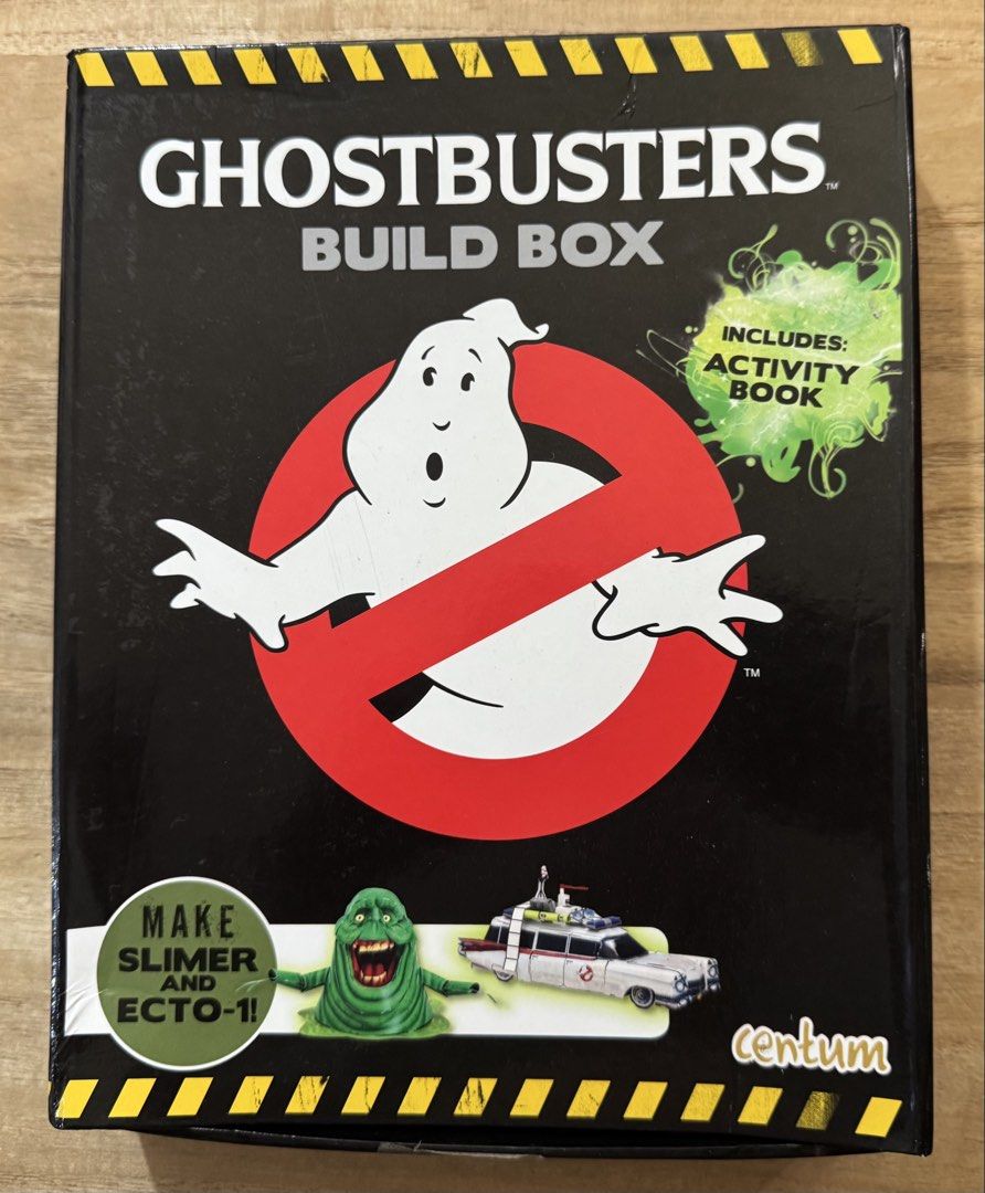 Ghostbusters Build Box Activity and Model Fun Book (Category: Children's Books) located in San Pedro. Submitted by pageturner19 (Listing ID 1470156695, Image 1). Description: Note: unused, opened box to check contents - Official Ghostbusters Build Box set by Centum - Includes activity book packed with fun supernatural puzzles - Comes with punch-out paper pieces to build 3D models of Slimer and ECTO-1 - All model sheets and book pages are complete