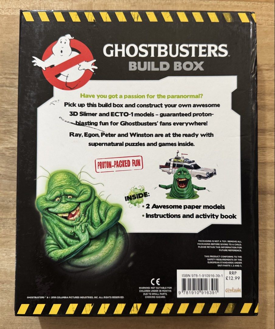 Ghostbusters Build Box Activity and Model Fun Book (Category: Children's Books) located in San Pedro. Submitted by pageturner19 (Listing ID 1470156695, Image 2). Description: Note: unused, opened box to check contents - Official Ghostbusters Build Box set by Centum - Includes activity book packed with fun supernatural puzzles - Comes with punch-out paper pieces to build 3D models of Slimer and ECTO-1 - All model sheets and book pages are complete