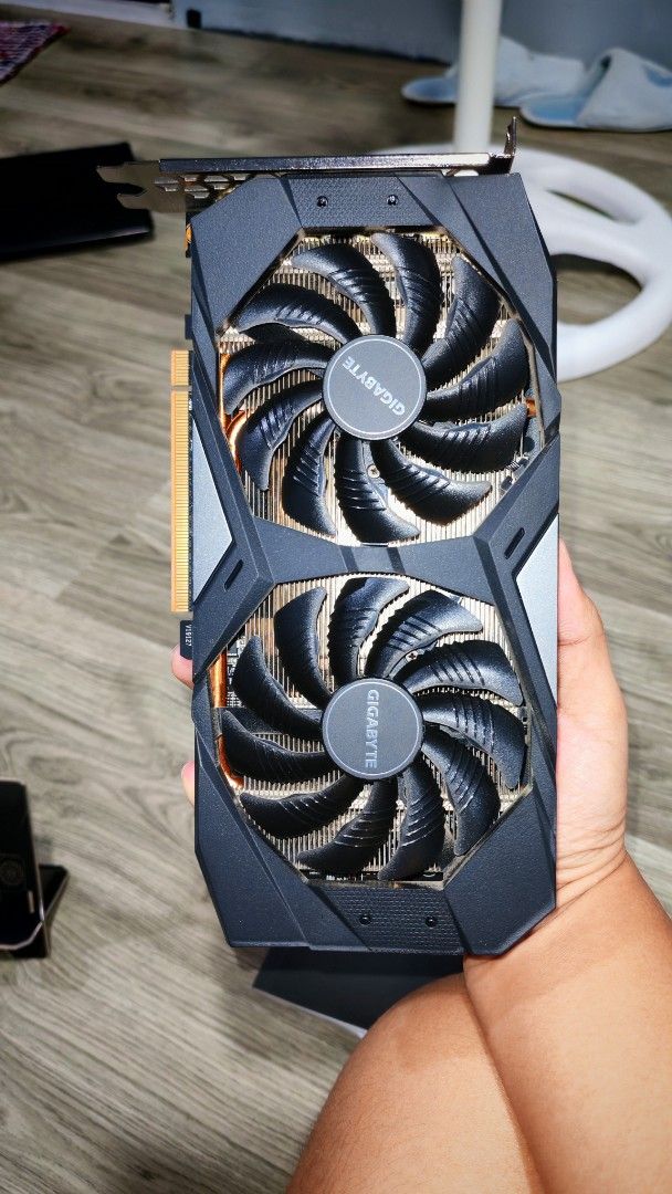 Gigabyte Dual Fan Graphics Card (Category: Computer Parts) located in Antipolo. Submitted by fonsyy (Listing ID 1470285277, Image 2). Description: - Brand/Model: Gigabyte Graphics Card - Design: Dual fans with clean black shroud - Condition: Excellent, pulled from a working setup - Performance: Fans spin smoothly, ideal for mid-range gaming rigs - Value: Great and reliable budget option - Meet-ups and shipping available, PM to inquire!.