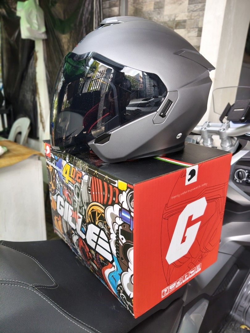 Gille Visage Open Face Helmet Matte Grey (Category: Bicycles) located in Makati City. Submitted by joel_888 (Listing ID 1470165078, Image 2). Description: - Brand: Gille Visage open face motorcycle helmet - Color: Matte grey with a pre-installed tinted visor - Interior: Removable red and black honeycomb padding for comfort and easy cleaning - Safety: DOT and ECE certified ratings printed at the back - Condition: Brand new, never worn (box opened 