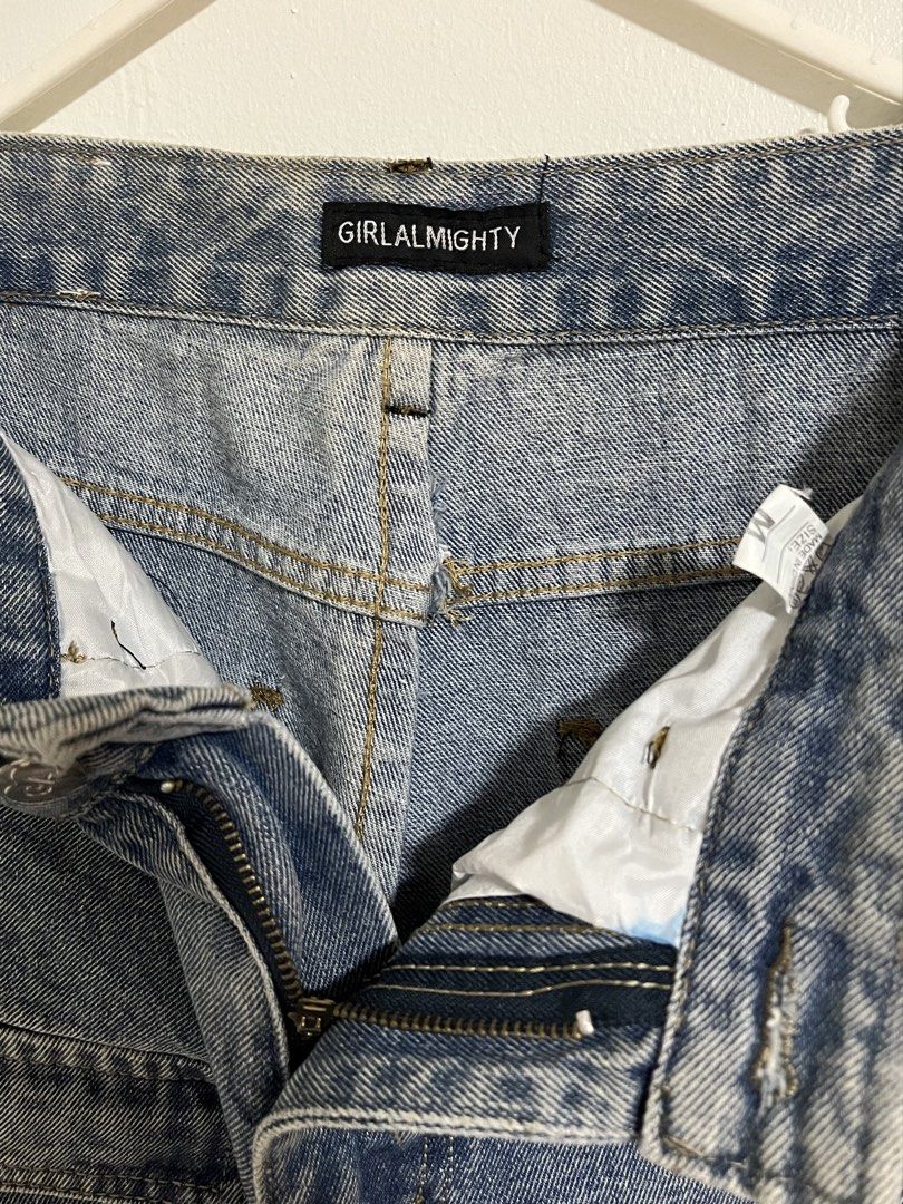 Girl Almighty Denim Cargo Jeans (Category: Jeans) located in Cabuyao City. Submitted by rdtrmt (Listing ID 1470345563, Image 2). Description: - Brand: Girl Almighty - Item: Denim cargo pants - Color/Wash: Medium wash - Size: Medium (M) - Fit: Straight leg - Closure: Zip fly with button - Details: Multiple utility pockets, white brand patch on back waistband - Style: Casual streetwear, easy to pair with tees and sneakers - Condition: still in good