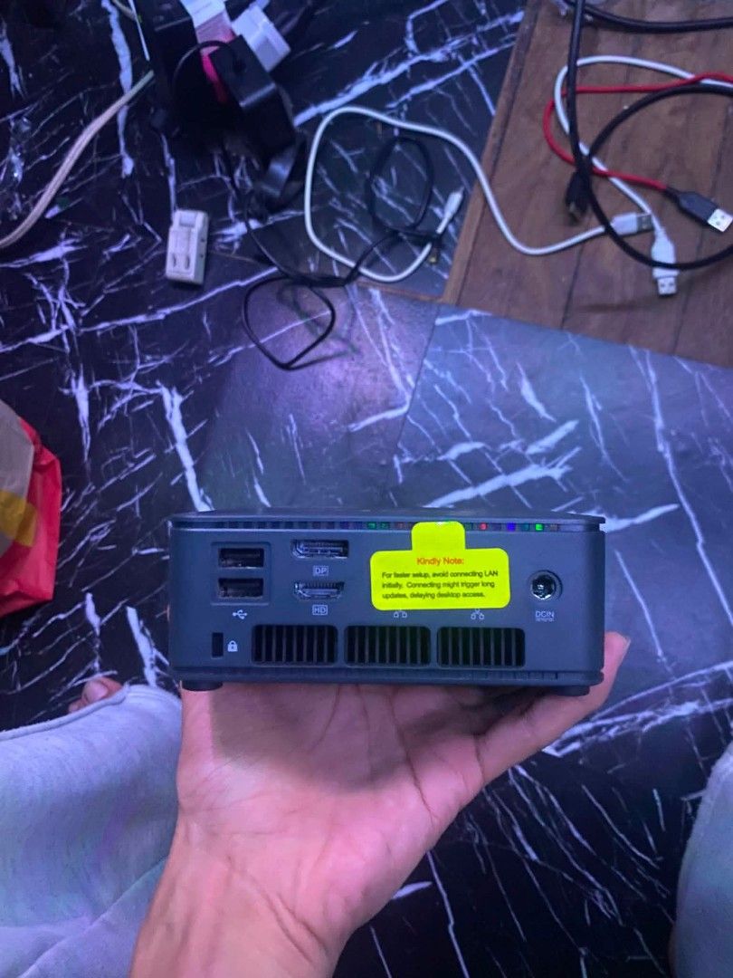GMKtec Ryzen 7 5000 Series Mini PC (Category: Desktops) located in Manila. Submitted by pcbest (Listing ID 1470144147, Image 2). Description: - Brand/Model: GMKtec Mini PC - Processor: AMD Ryzen 7 5000 series with Radeon Graphics - Design: Compact small form factor, saves valuable desk space - Ports: Dual USB, DisplayPort, HDMI, and LAN (with original yellow warning sticker still attached) - Condition: Excellent, neatly used and fully functional 