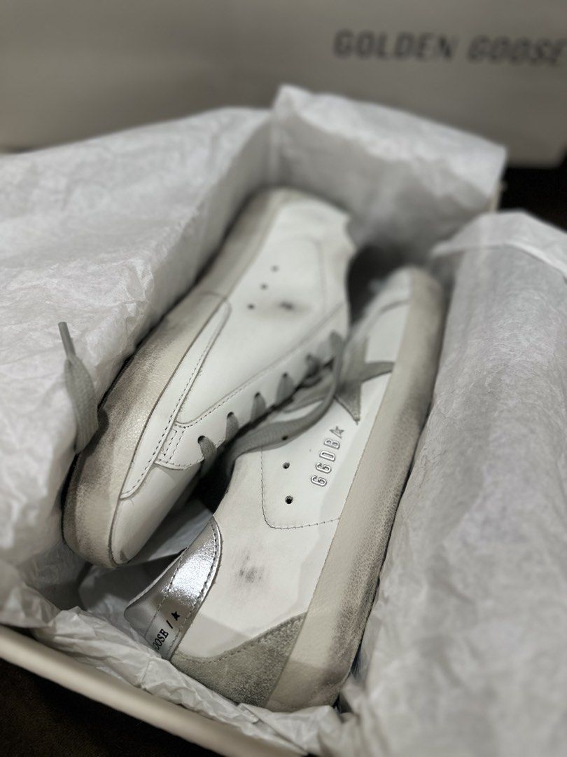 Golden Goose Superstar | Silver Star (Category: Sneakers & Footwear) located in Cebu City. Submitted by maeganllanos (Listing ID 1470201244, Image 3). Description: Golden Goose Super-Star sneakers in white with a silver star, grey laces, and metallic silver heel tab. Original price: 30,500 (Paris-bought in June 2025) Condition: Pre-loved, lightly worn since it’s not one of my go-to pairs Complete with original box and inclusions Price: ₱23,500, s