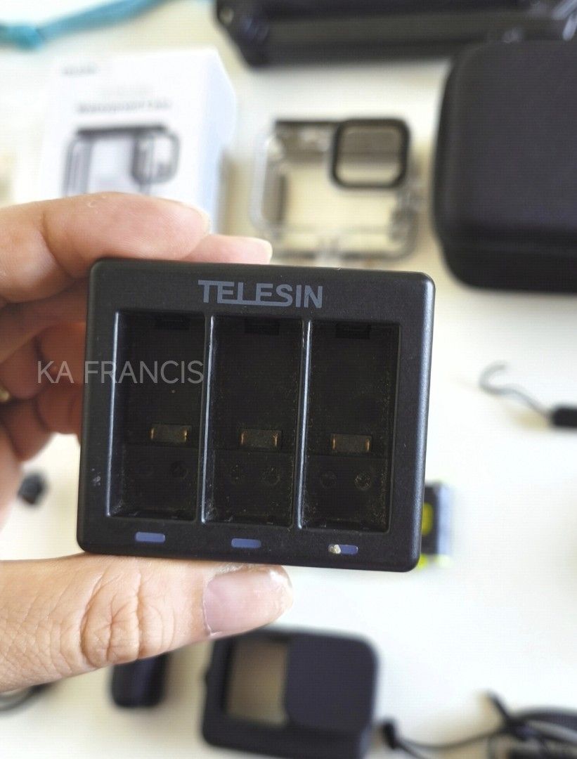 GoPro Hero 9 or 10 Bundle with Telesin Accessories (Category: Video Cameras) located in Tanza. Submitted by kafrancis (Listing ID 1470302094, Image 2). Description: - Complete GoPro camera setup ready for your next adventure - Power: Telesin 3-channel battery charger + 4 working Telesin batteries + 1 original GoPro battery (weak charge) - Protection: Telesin waterproof housing case and silicone protective sleeve - Mounts & Grips: Mini tripod, sel