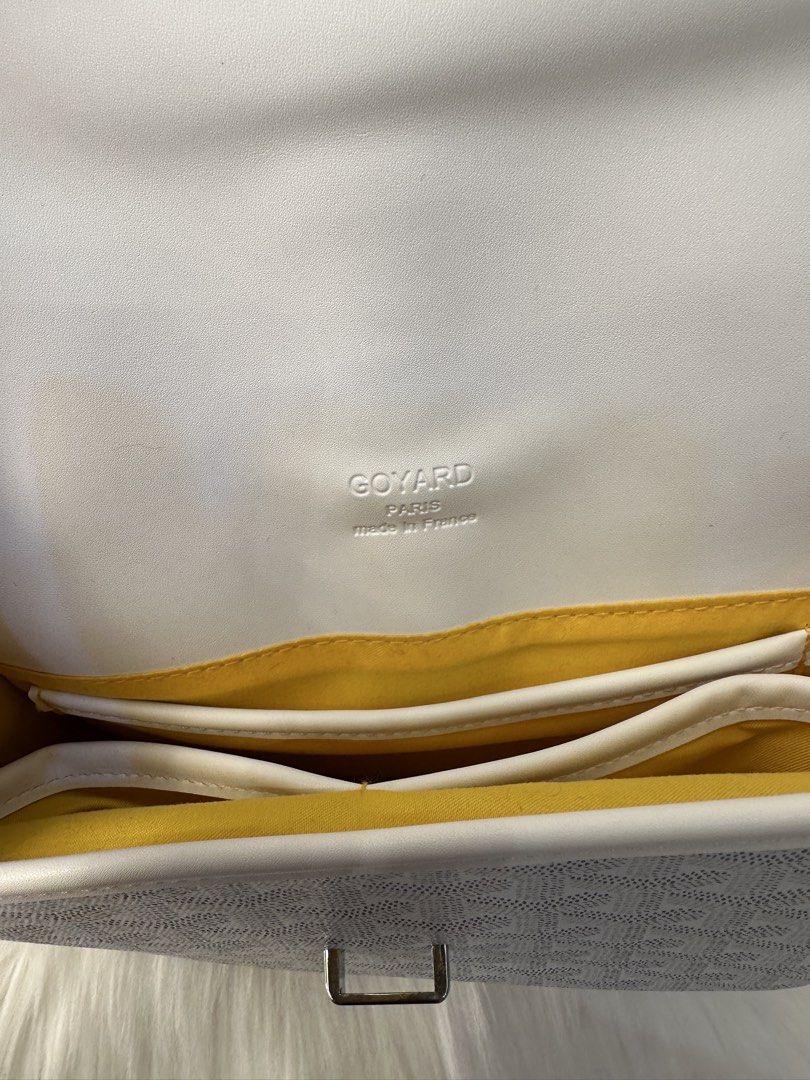 Goyard White Monogram Crossbody Bag (Category: Luxury Bags & Wallets) located in Manila. Submitted by audreyhepburn21 (Listing ID 1470317416, Image 2). Description: - Brand: Goyard Paris (Made in France) - Color/Print: White monogram with clean white leather trim - Hardware: Silver-toned with front flap buckle closure - Strap: Adjustable white leather shoulder strap - Interior: Bright yellow fabric lining with multiple compartments and pockets - 