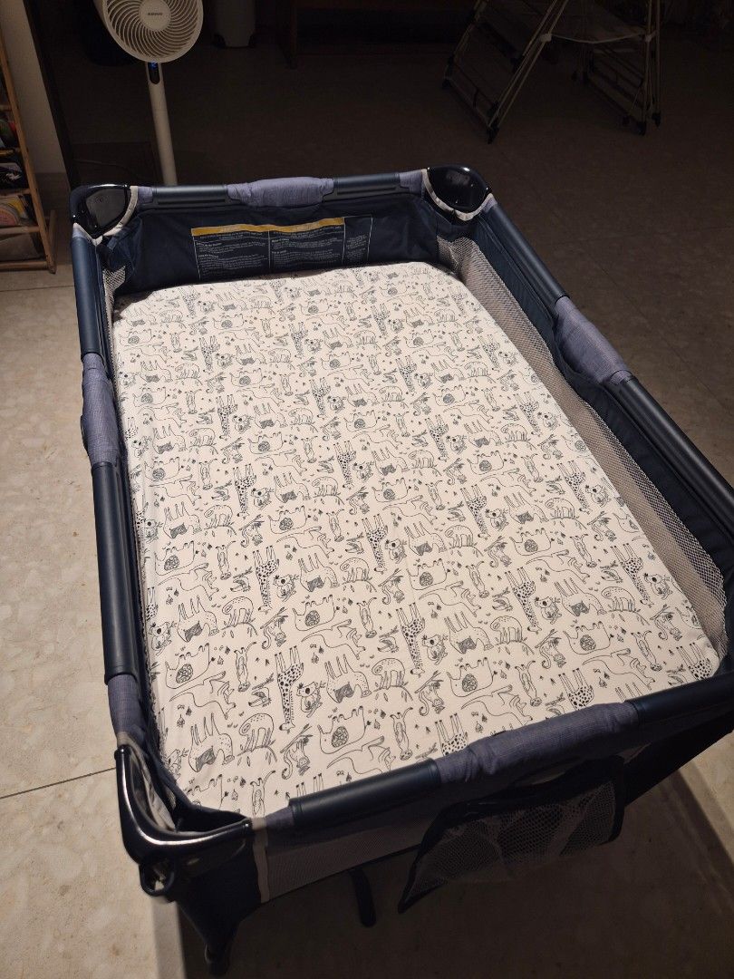 Graco Pack 'n Play Portable Playard (Category: Cots & Cribs) located in Pasig City. Submitted by hsyap (Listing ID 1470269395, Image 3). Description: Graco Pack n Play - foldable and portable - complete set with carrying cover and manual - tiny winks waterproof mattress and 2 bedsheets included - RFS: outgrown - price: 4,500php +sf, slightly negotiable - ships from Pasig.