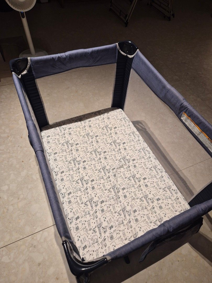 Graco Pack 'n Play Portable Playard (Category: Cots & Cribs) located in Pasig City. Submitted by hsyap (Listing ID 1470269395, Image 2). Description: Graco Pack n Play - foldable and portable - complete set with carrying cover and manual - tiny winks waterproof mattress and 2 bedsheets included - RFS: outgrown - price: 4,500php +sf, slightly negotiable - ships from Pasig.