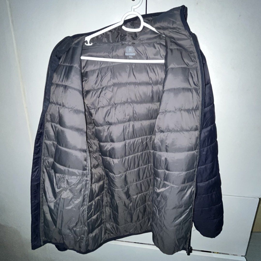 Gravity Navy Blue Puffer Hooded Jacket (Category: Coats, Jackets and Outerwear) located in Quezon City. Submitted by annmalabanan (Listing ID 1470277028, Image 3). Description: Location: Palmera Homes, Novaliches, QC.