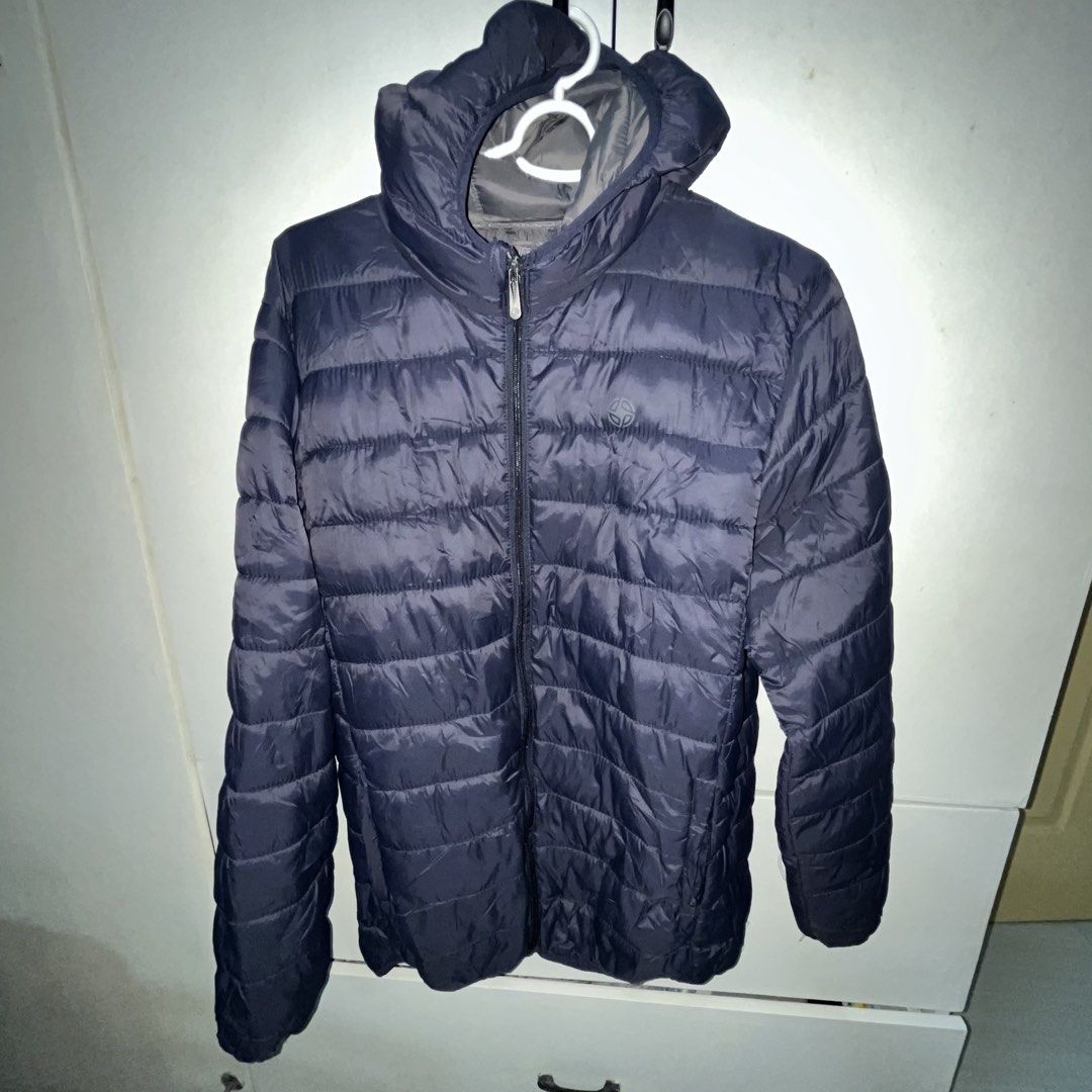 Gravity Navy Blue Puffer Hooded Jacket (Category: Coats, Jackets and Outerwear) located in Quezon City. Submitted by annmalabanan (Listing ID 1470277028, Image 1). Description: Location: Palmera Homes, Novaliches, QC.