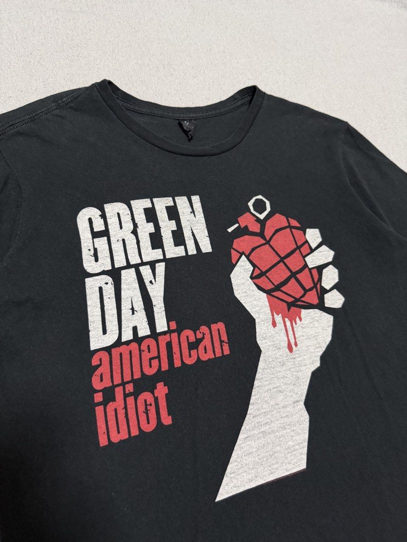 Greenday y2k “american idi*t” Tee (Category: Tshirts & Polo Shirts ) located in Bulacan. Submitted by sanjisthrift (Listing ID 1470324570, Image 2). Description: Size Medium Width 19 Length 27 Very Good Condition 9/10 Good fade.
