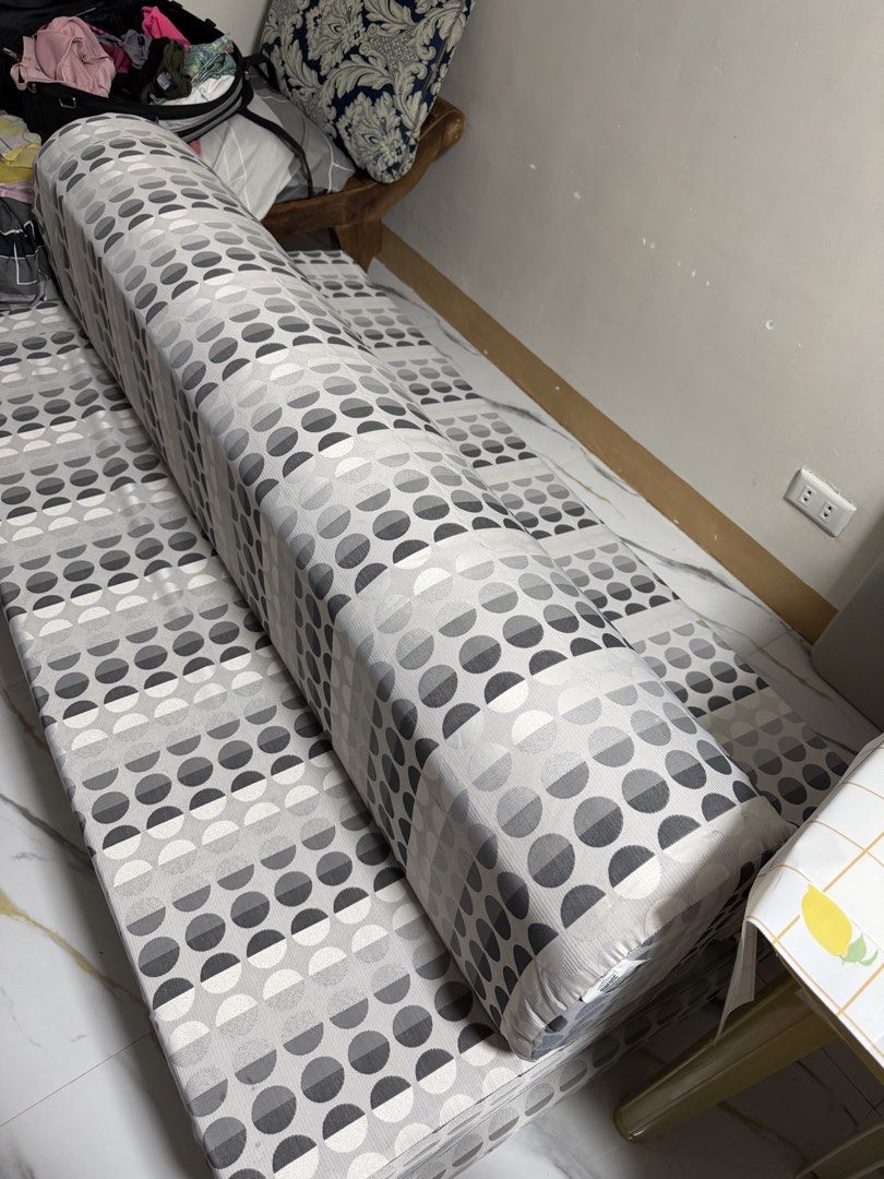 Grey and White Patterned Foldable Sofa Bed (Category: Sofas) located in Makati City. Submitted by cathymars13 (Listing ID 1470194400, Image 2). Description: Location Pagsinag East Naic Cavite Mandaue Foam Mega Sit and Sleep Sofa Bed Queen Size 60 × 75 inches 6 inches thick Memory Foam - Style: Modern grey and white geometric dot pattern - Function: Easily converts from a sofa to a flat mattress - Design: Clean surface with a convenient zipper clo