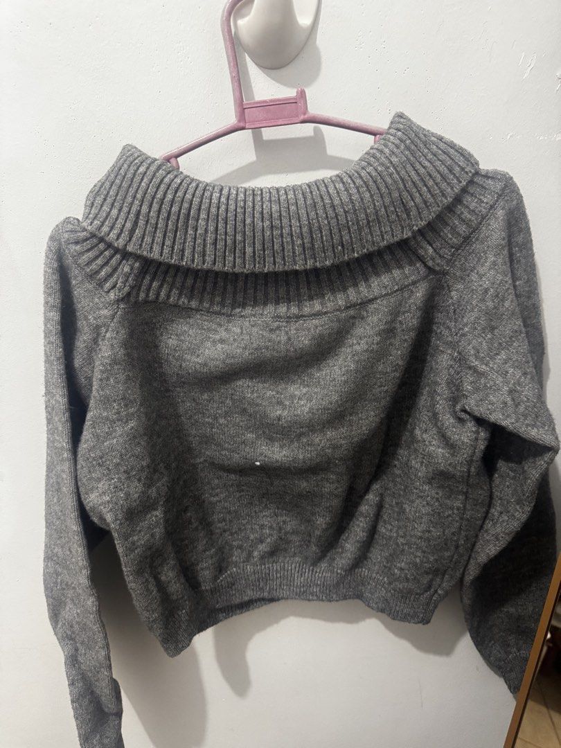 Grey Off-Shoulder Foldover Ribbed Knit Sweater (Category: Longsleeves) located in Marikina City. Submitted by potchayy (Listing ID 1470263839, Image 2). Description: - Color: Grey - Style: Cropped knit sweater with a versatile wide foldover collar (wear off-shoulder or draped) - Details: Ribbed texture on the collar, cuffs, and hem - Material: Soft, warm, and cozy fabric ideal for cold weather - Fit: Long sleeves, cropped - Pairing: Great with hi