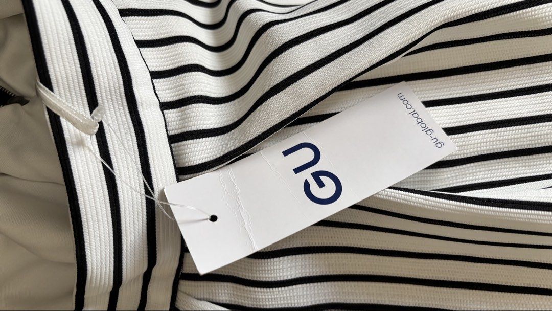 GU Black and White Striped Skirt (Category: Skirts) located in Makati City. Submitted by jules000 (Listing ID 1470200440, Image 3). Description: - Brand: GU - Condition: Brand new with tags (BNWT) - Style: Black and white striped skirt - Size: M (Waist: 65cm) - Material: 99% polyester, 1% polyurethane (100% polyester lining) - Closure: Back zipper.