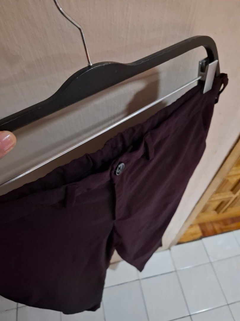 GU Dark Purple Trousers Size M (Category: Trousers) located in Quezon City. Submitted by phillip31 (Listing ID 1470348252, Image 2). Description: - Brand: GU - Color: Dark Purple - Size: M (Tag: 170/76A) - Material: 66% polyester, 32% rayon, 2% polyurethane - Closure: Standard waist button - Condition: Clean stitching and comfortable fabric blend - Style: Versatile staple for casual or office wear.