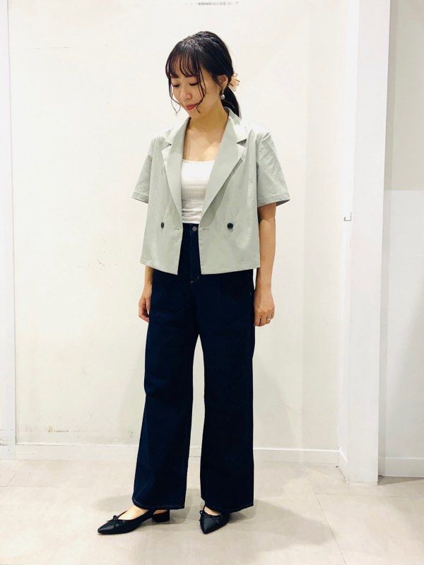 GU Short Sleeve Cropped Blazer (Category: Coats, Jackets and Outerwear) located in Solano. Submitted by hayami. (Listing ID 1470194130, Image 2). Description: - Brand: GU - Item: Short sleeve cropped blazer - Color: Sage green - Size: L (Made in Vietnam) - Material: 100% polyester (75% recycled polyester fiber) - Design: Double-breasted with dark buttons and lapel collar - Style Tip: Great for layering over casual tanks or tees for a smart-casual