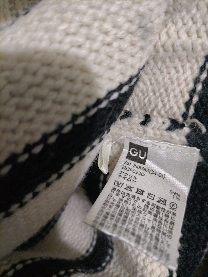 GU Striped Knit Cardigan (Category: Coats, Jackets and Outerwear) located in Valenzuela. Submitted by nurzdara28 (Listing ID 1470288258, Image 2). Description: GU Striped Knit Cardigan (round neck, long-sleeve, black and white striped pattern with tortoiseshell buttons) Brand: GU Design: Round neck with black-and-white horizontal stripes Details: Tortoiseshell-style front buttons and ribbed trim Size Shown: Medium (M) but can fit to Large.