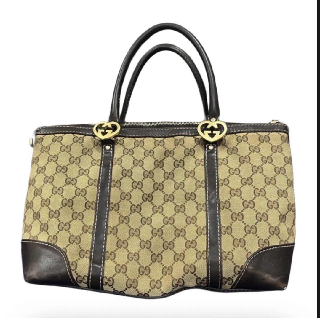 Gucci Canvas Lovely Tote Bag (Category: Luxury Bags & Wallets) located in Cotabato. Submitted by nacreous (Listing ID 1470290639, Image 1). Description: DESCRIPTION: ➤ Pre-loved item ➤ Visible flaws include rubs on two corners only and minimal fading on the gold hardware (additional photos will be provided) FEATURES: Exterior ➤ Beige canvas material with brown genuine leather trims ➤ Brown “GG” monogram ➤ Gold hardware Interior ➤ Cream-colored ca