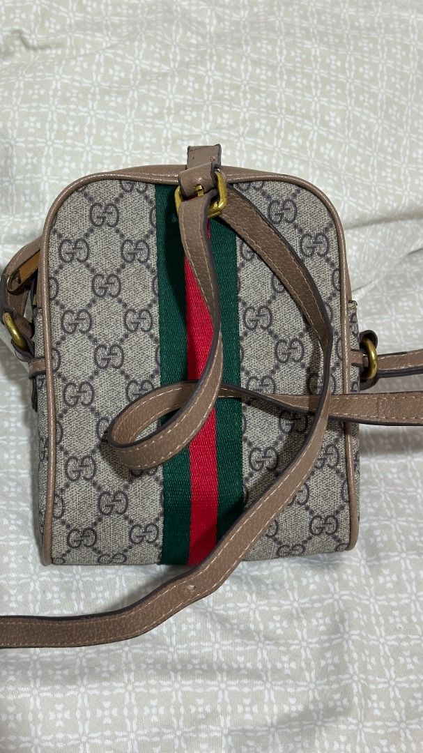 Gucci GG Monogram Mini Messenger Bag – Green & Red Stripe (Category: Luxury Bags & Wallets) located in San Juan, La Union. Submitted by ayraaxfzz (Listing ID 1470295409, Image 3). Description: Original price: Approximately ₱68,000–₱70,000 Selling my pre-loved Gucci messenger bag in excellent overall condition. The exterior is very well-maintained, with no visible damage. It features the classic GG monogram canvas, green-and-red Web stripe, gold-t