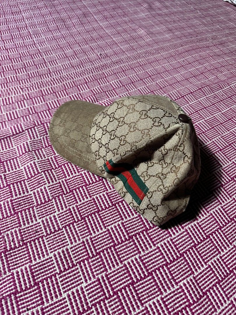 Gucci GG Supreme Baseball Cap (Category: Caps & Hats) located in Manila. Submitted by wardrobeph.com (Listing ID 1470318440, Image 2). Description: - Authentic Gucci baseball cap in classic beige GG monogram canvas - Iconic red and green web stripe detail on the sides - Adjustable back strap with durable metal hardware - Complete with interior Gucci branding tags and care labels - Great way to elevate any casual everyday outfit - Condition: Excel