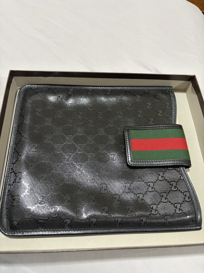 Gucci ipad case (Category: Luxury Accessories) located in Makati City. Submitted by rnathaliem (Listing ID 1470216429, Image 3). Description: Guccissima Black iPad Case featuring the signature green and red Web stripe tab closure ( 500 by Gucci limited edition collection).