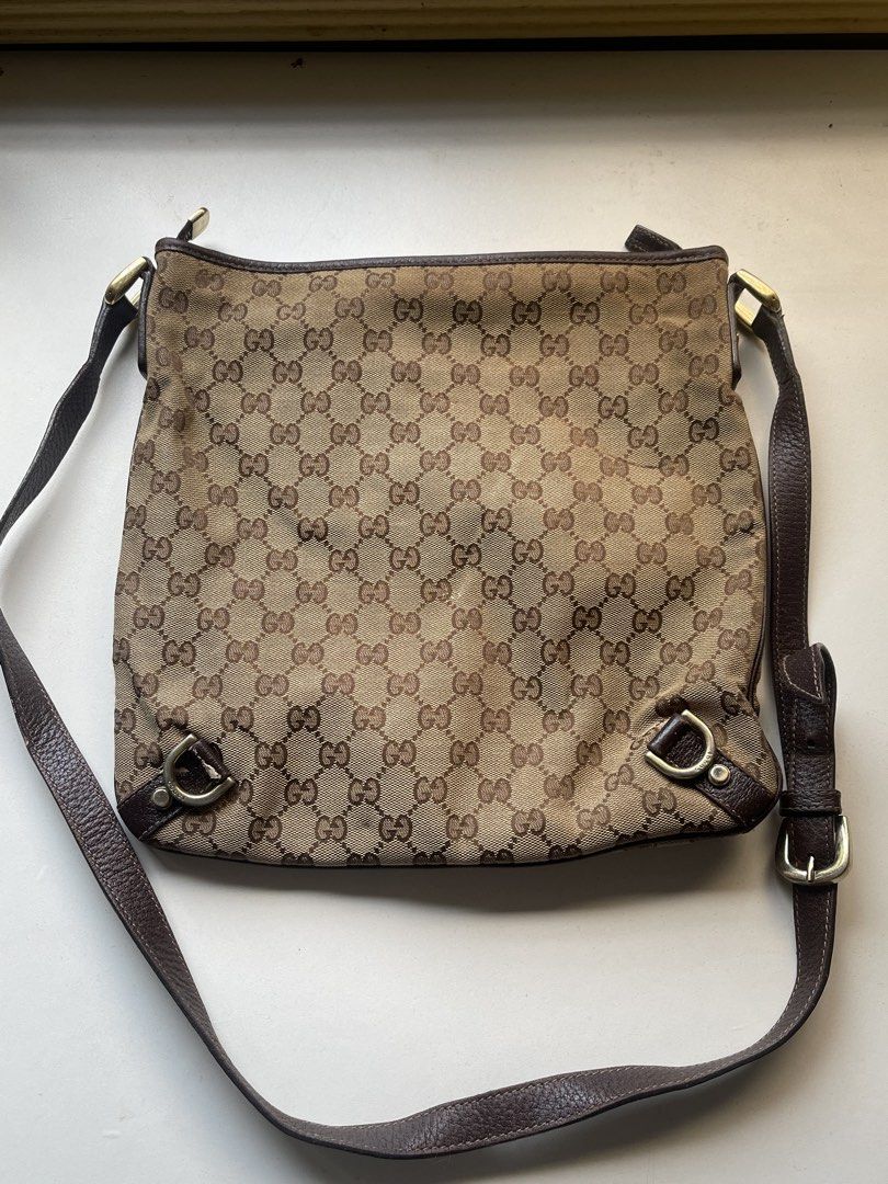 Gucci Monogram Abbey Messenger Bag (Category: Shoulder Bags) located in Manila. Submitted by fionaret (Listing ID 1470164896, Image 2). Description: - Authentic Gucci Monogram Abbey Messenger Bag - Classic brown GG canvas with dark brown leather trim and gold-tone D-ring hardware - Adjustable leather shoulder/crossbody strap - Clean interior lining with embossed Gucci logo and serial number (131326 2684).