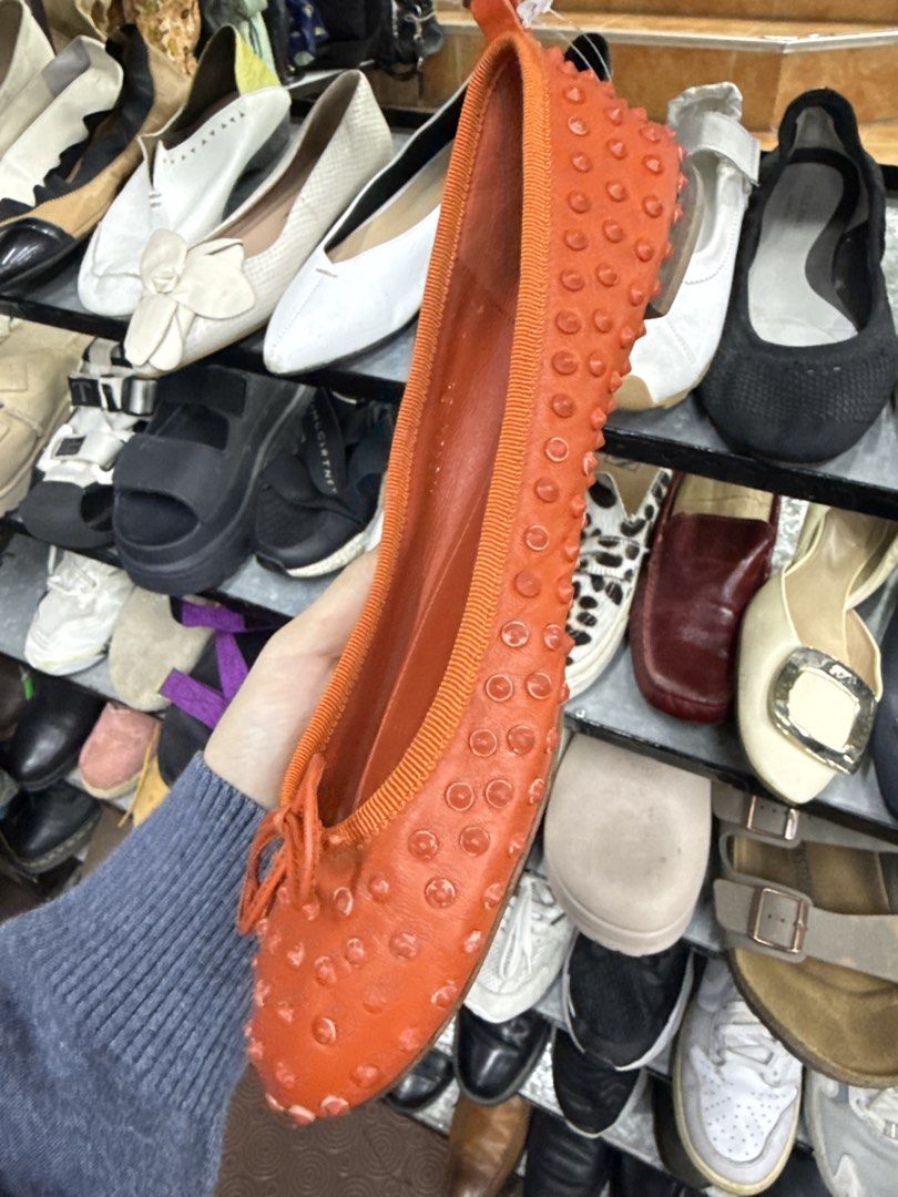 Gucci Orange Studded Leather Flats Size 38 (Category: Flats & Sandals) located in Abucay. Submitted by fastlion.584bdf (Listing ID 1470269175, Image 3). Description: - Brand: Gucci - Style: Slip-on flats with front bow detail - Color: Bright orange - Size: 38 (marked on sole) - Material: Leather lining with all-over stud embellishments - Condition: Upper leather is clean and bright; normal wear on the bottom soles from walking.
