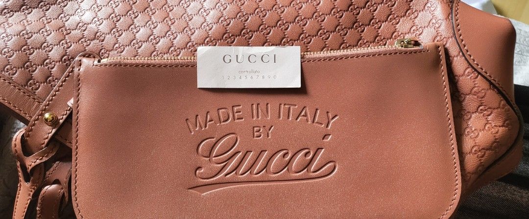 Gucci Tote with Pouch guaranteed (Category: Luxury Bags & Wallets) located in Mandaluyong City. Submitted by amps.ae (Listing ID 1470301551, Image 3). Description: - Original Guccissima Leather Tote Bag ( like neverfull PM size) - Includes matching detachable leather zip pouch - Signs of use is minimal, only sa edges of it bottom - 100% guaranteed, pick up at my house for peace of mind..