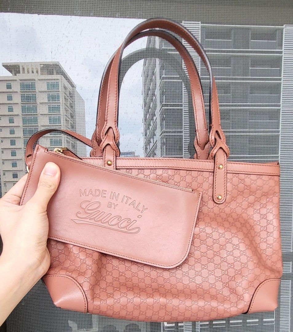 Gucci Tote with Pouch guaranteed (Category: Luxury Bags & Wallets) located in Mandaluyong City. Submitted by amps.ae (Listing ID 1470301551, Image 1). Description: - Original Guccissima Leather Tote Bag ( like neverfull PM size) - Includes matching detachable leather zip pouch - Signs of use is minimal, only sa edges of it bottom - 100% guaranteed, pick up at my house for peace of mind..
