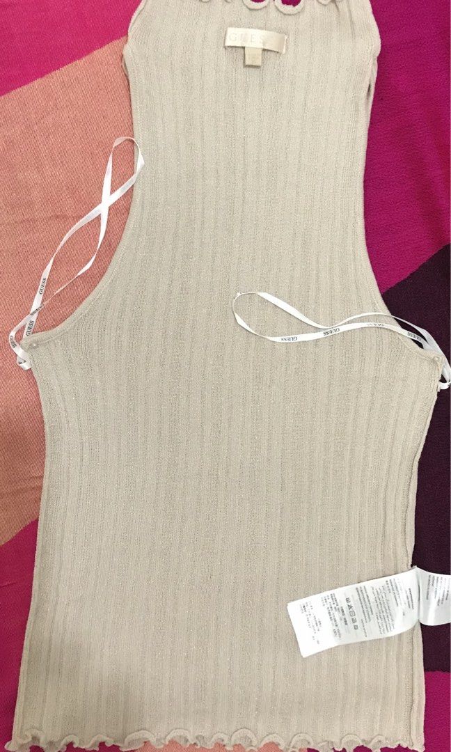 Guess Tops Beige color size xs stretchable (Category: Others Tops) located in Manila. Submitted by freecat.21c0ee (Listing ID 1468232957, Image 2). Description: Guess Tops elegant for women. I bought it for my Daughter but I got the wrong size. the tag has been removed but it's new. size xs but fit to small. stretchable.