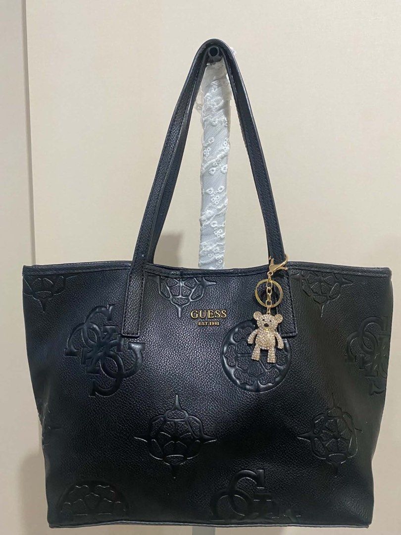 Guess Vikky Tote (Category: Tote Bags) located in Quezon City. Submitted by vintagepurse.vault (Listing ID 1470219579, Image 1). Description: Guess tote bag in classic black - Comfortable double shoulder straps - Clean overall condition - No flaws - Minimal signs of usage.