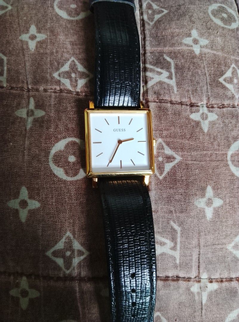 Guess watch vintae (Category: Women's Watches) located in Malabon City. Submitted by budoy1994 (Listing ID 1470211679, Image 1). Description: FOR SALE: Original GUESS Watches (His & Hers Bundle / Separated) Selling my pre-loved authentic Guess watches. Good for couple watches, personal use, or pang-regalo. 100% original. 1. Guess W0996G2 (Men's / Square Face) - Design: Gold-tone square case, white minimalist dial - Strap: Black genuine leather st