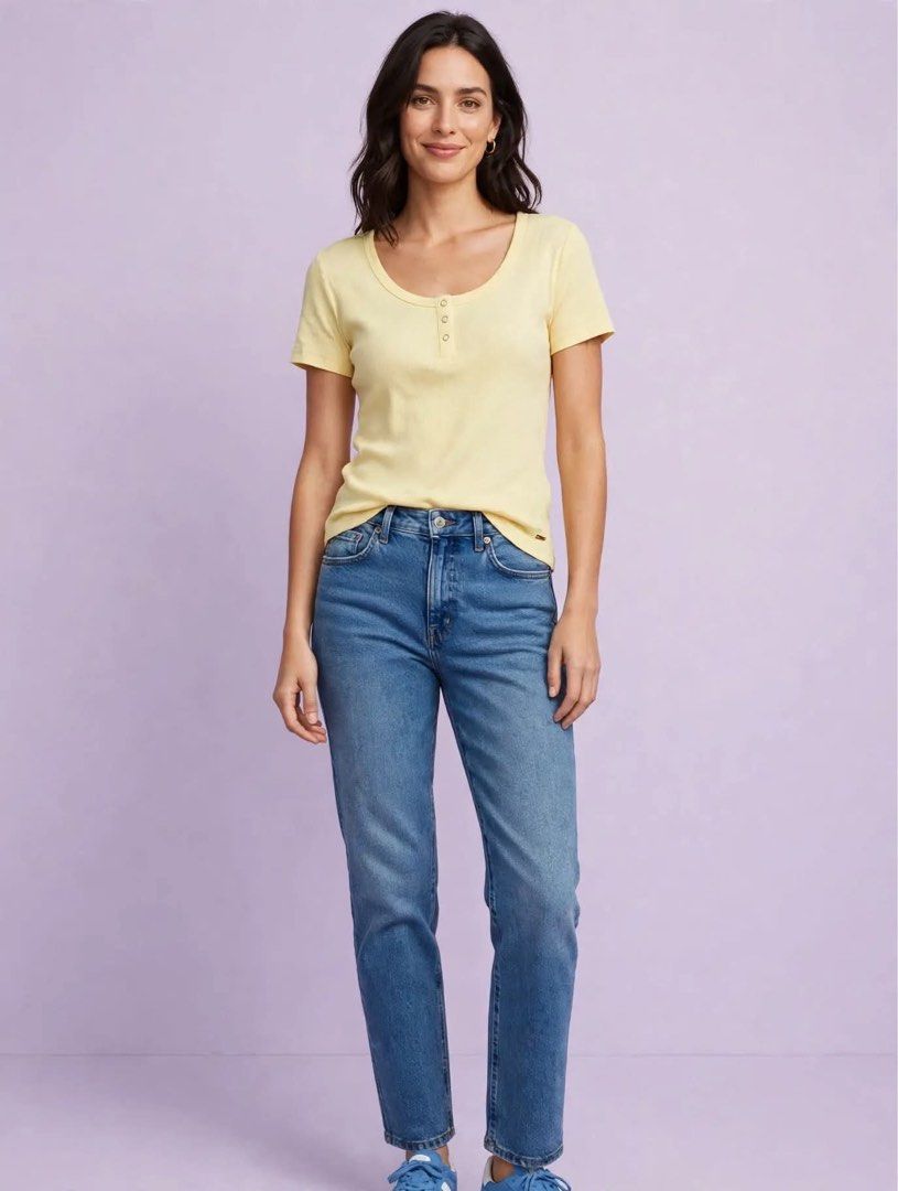 Guess Yellow Ribbed Button Henley Top (Category: Blouses) located in Cavite. Submitted by luxxe.muse (Listing ID 1470289015, Image 2). Description: - Brand: Guess - Color: Trendy pastel butter yellow - Style: Slim fit basic top with scoop neck and short sleeves - Details: 3 decorative front buttons and signature metal Guess logo tag near the hem - Material: Soft, stretchy ribbed cotton for all-day comfort - Condition: Excellent / Like new - Perfe