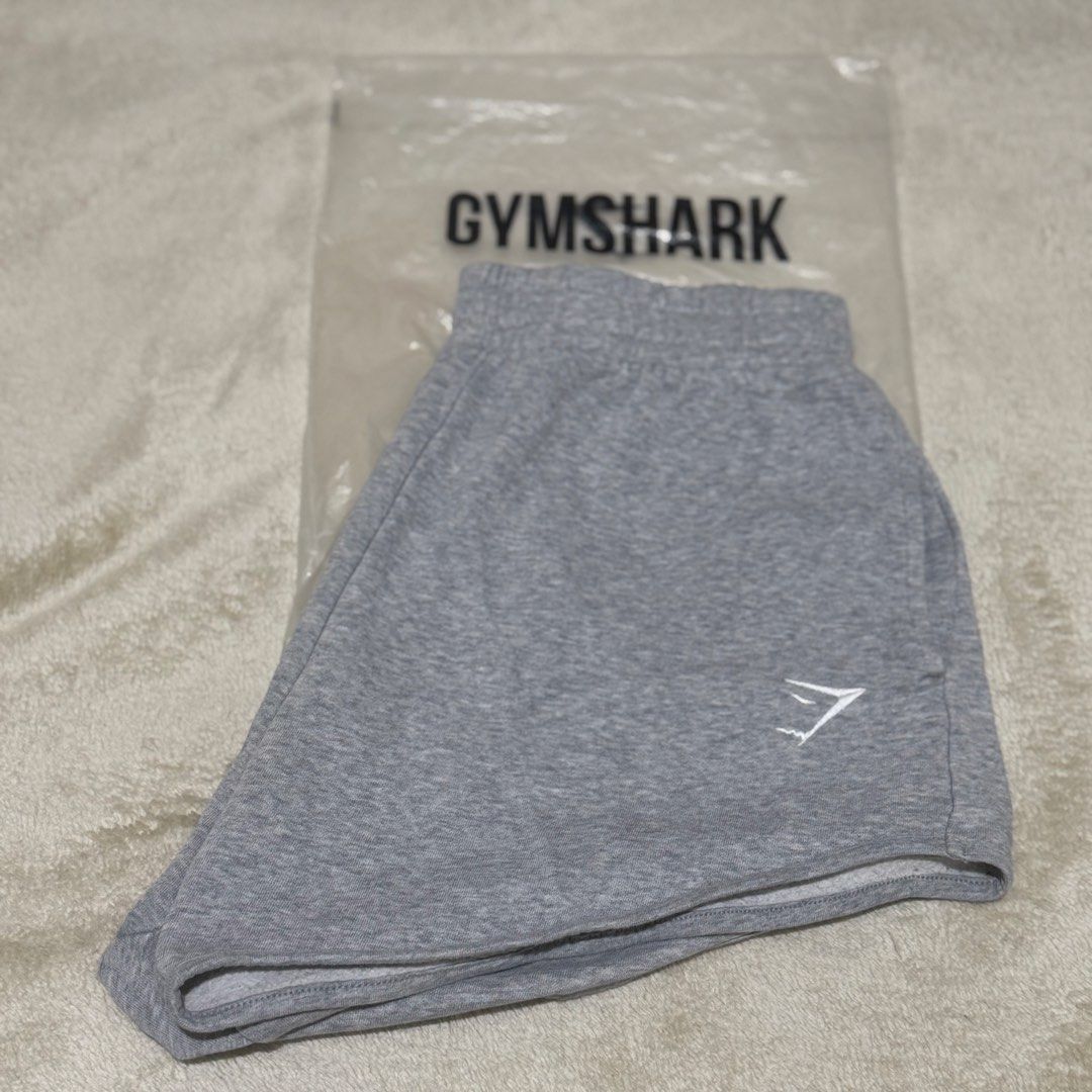 Gymshark Grey Sweat Shorts – Medium (Category: Activewear) located in Pasay City. Submitted by bellita_05 (Listing ID 1470202086, Image 3). Description: Gymshark grey marl sweat shorts with the signature Gymshark logo. Comfortable, casual and perfect for gym sessions, lounging or everyday wear. ✨ Brand: Gymshark ✨ Colour: Grey marl ✨ Size: Medium (M) ✨ Style: Sweat shorts ✨ Fit: Relaxed fit ✨ Design: Elasticated waistband and curved hem.