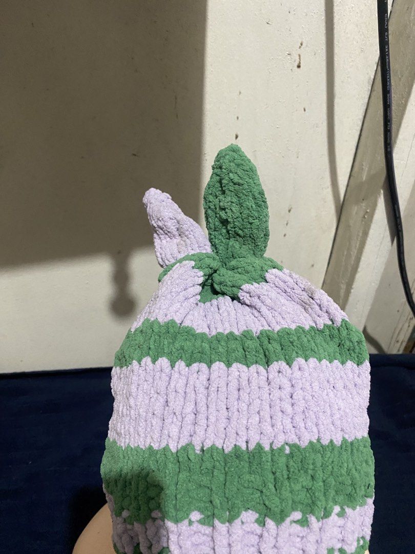 Handmade Crochet Bunny Ear Striped Beanie Hat (Category: Hats & Beanies) located in Manila. Submitted by resi.diaz (Listing ID 1470322227, Image 2). Description: - Handmade purple and green striped beanie - Thick plush yarn for ultimate warmth - Cute bunny ear details on top - Chunky knit texture - Stretch fit, fits most head sizes.