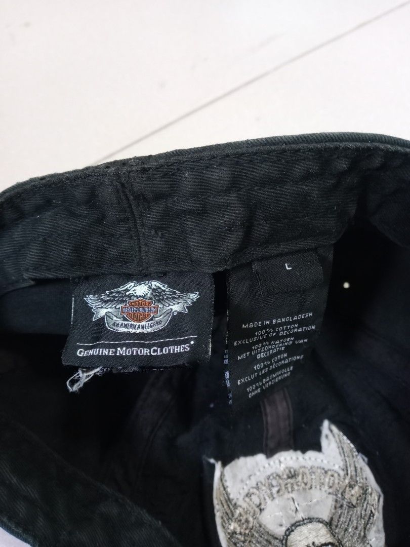 Harley Davidson Distressed Cap Skull Wings Logo Size L (Category: Caps & Hats) located in Manila. Submitted by onewikstraight (Listing ID 1470209900, Image 3). Description: - Authentic Harley-Davidson distressed cap in dark grey - Features embroidered skull & wings patch with Milwaukee Wisconsin printed graphics - Size: L (labeled inside) - Material: 100% cotton, made in Bangladesh - Design details: Distressed finish with stylish frayed edges on 