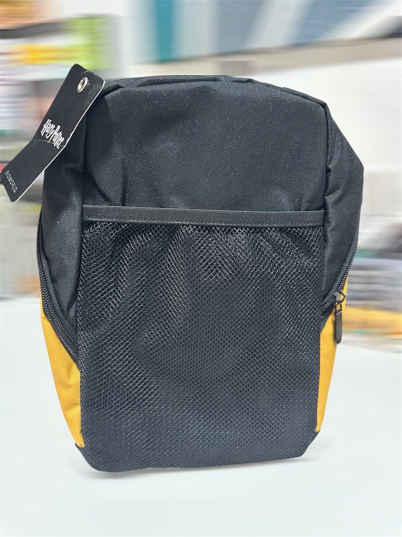 Harry Potter Hufflepuff Insulated Lunch Box Bioworld (Category: Food Organization & Storage) located in Taguig. Submitted by heytreasure (Listing ID 1470155352, Image 3). Description: Decluttering. Bought for my daughter but never got to use. - Official Harry Potter Bioworld Hufflepuff lunch box - Bright yellow and black canvas with house crest and "Loyalty, Patience, Dedication" text - Insulated main compartment with foil lining - Convenient fro
