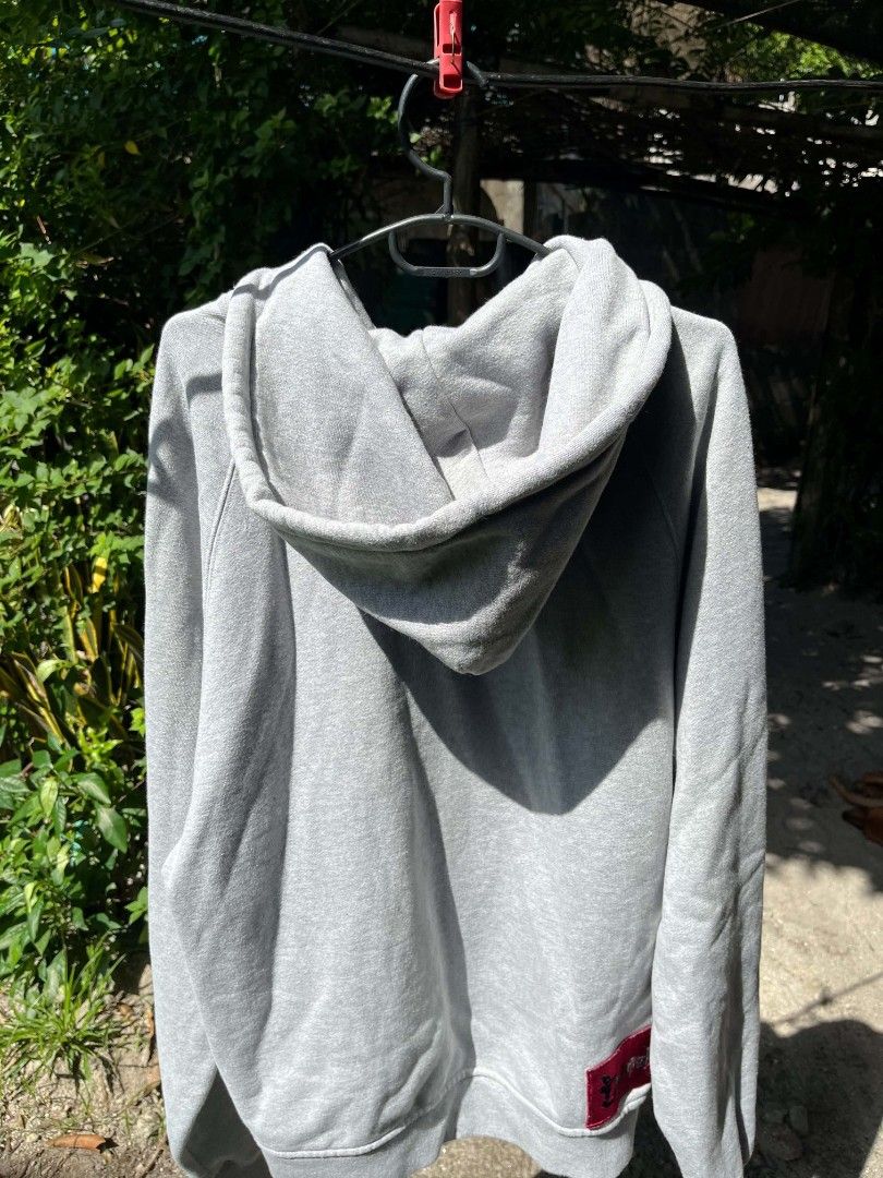 Heavyweight Gray Full-Zip Hoodie With Back Bottom Patch (Category: Hoodies) located in Dinalupihan. Submitted by ronthrifthings (Listing ID 1470143441, Image 1). Description: Premium Heavyweight Gray Full-Zip Hoodie Features: -SIZE: 23W-27L - Color: Classic Heather Gray - Fabric: Ultra-thick, heavy-cloth cotton blend. Feels sturdy, structured, and very warm. - Design: Clean minimalist front with split kangaroo pockets, raglan sleeve stitching, an