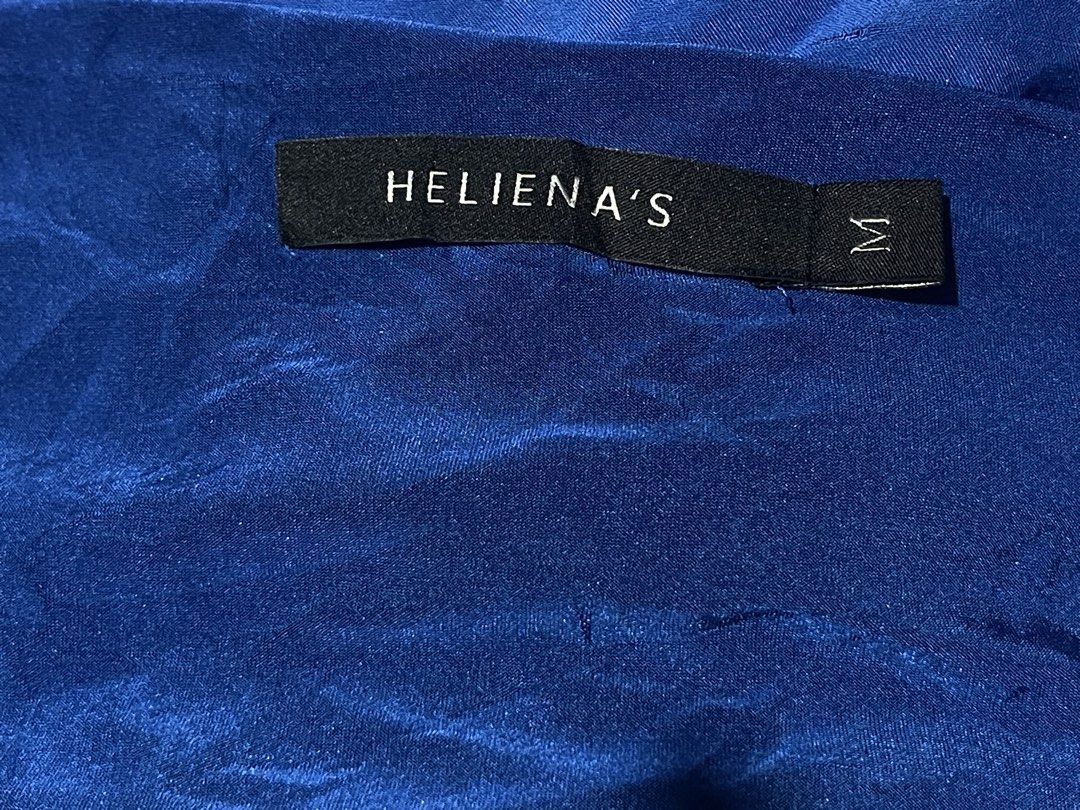 HELIENA'S Royal Blue minimalist Blous (Category: Blouses) located in Donsol. Submitted by saksthriftavenuebyluckymaria8 (Listing ID 1470290285, Image 3). Description: - Brand: HELIENA - Color: Royal Blue - Size: M - Material: Smooth silk blend fabric - Design: Relaxed boat neckline, wide flowing sleeves, and asymmetric curved hem - Style: Versatile; easy to dress up or keep casual HELIENA’s cobalt blue silk minimalist top Sz M chest 20-24in measu