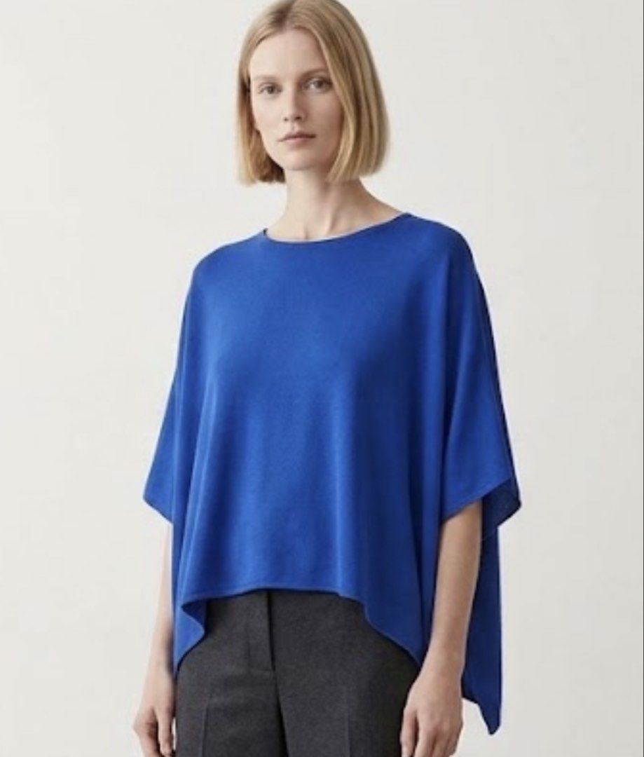 HELIENA'S Royal Blue minimalist Blous (Category: Blouses) located in Donsol. Submitted by saksthriftavenuebyluckymaria8 (Listing ID 1470290285, Image 1). Description: - Brand: HELIENA - Color: Royal Blue - Size: M - Material: Smooth silk blend fabric - Design: Relaxed boat neckline, wide flowing sleeves, and asymmetric curved hem - Style: Versatile; easy to dress up or keep casual HELIENA’s cobalt blue silk minimalist top Sz M chest 20-24in measu