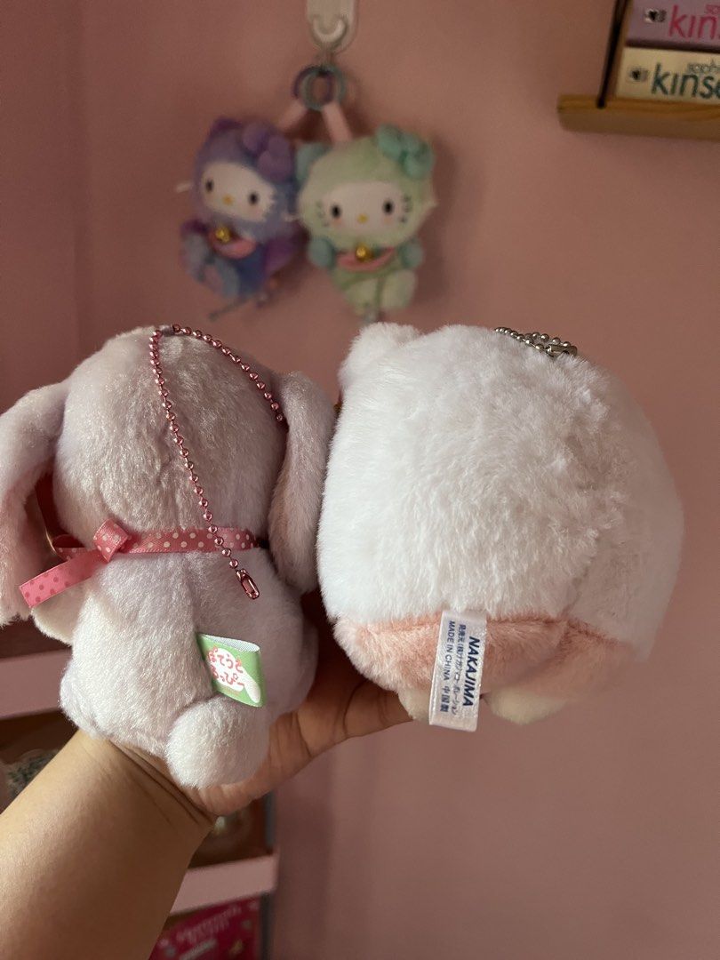 Hello Kitty and Bunny Plush Keychains Set (Category: Plushies & Soft Toys) located in Imus. Submitted by muyingyingyinggg (Listing ID 1470237651, Image 2). Description: - Authentic Nakajima plush keychains (Set of 2) - Includes Kitty in fluffy hood with candy & purple bunny with polka dot ribbon - Comes with bead chains for easy hanging on bags or keys - Brand new with original tags intact - Perfect gift or collection addition.