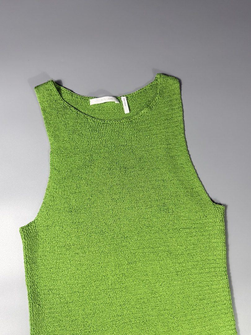 Helmut Lang Knit Tank Top (Category: Others Tops) located in Manila. Submitted by whowearsstreetwear (Listing ID 1470328430, Image 3). Description: Helmut Lang Knit Tank Top - Size: Medium on tag (measurements in inches) W - 15 L - 28 Condition: Excellent Flaw/s: none Stretchable material + shipping fee Location: Manila (Near UST).