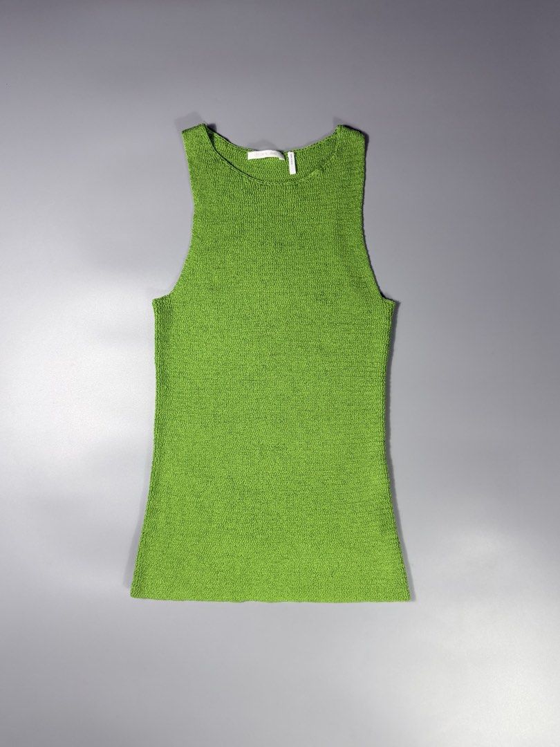 Helmut Lang Knit Tank Top (Category: Others Tops) located in Manila. Submitted by whowearsstreetwear (Listing ID 1470328430, Image 1). Description: Helmut Lang Knit Tank Top - Size: Medium on tag (measurements in inches) W - 15 L - 28 Condition: Excellent Flaw/s: none Stretchable material + shipping fee Location: Manila (Near UST).