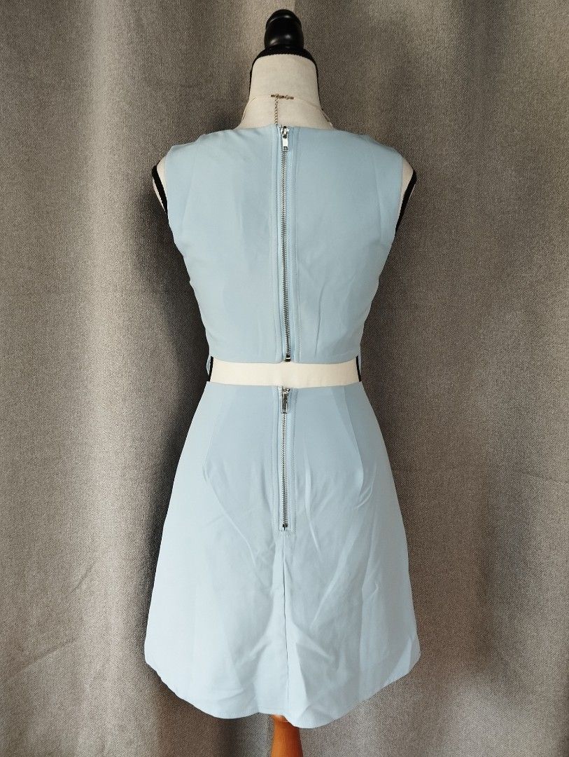 HERE COMES THE SUN light blue cutout mini dress (Category: Dresses) located in Alicia. Submitted by glambercena (Listing ID 1470201773, Image 3). Description: dimes: bust: 31"-32" (armpit to armpit) waist: 25" length: 31" XS on tag.